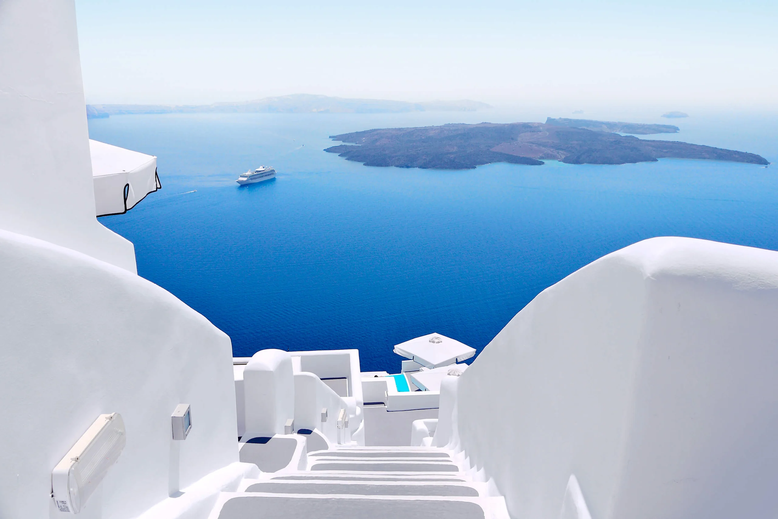 Whitewashed Santorini terrace above the caldera